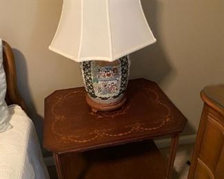 This table needs a little bit of repair on bottom shelf.