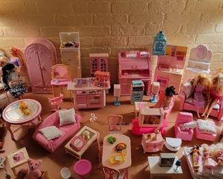 Looking to sell all of this barbie furniture and a few dolls as a package 200.00 obo.