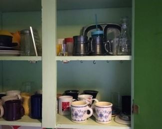 household mugs, plastic mugs and plates, sugar dispenser