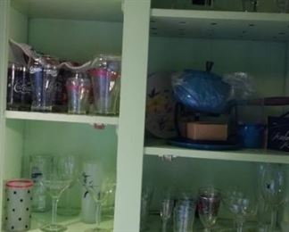 Coka-cola glass collection, Mid mod fondue pot with mid-mod fork set, Mr. Coffee maker, pyrex plates. 