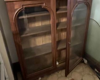 Antique cabinet with glass doors