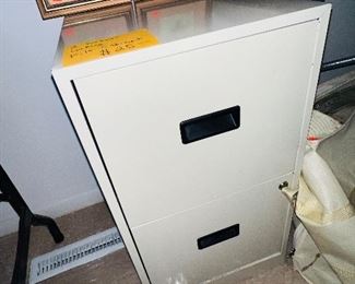 Locking metal file cabinet with key
