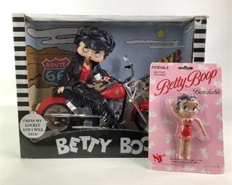Betty Boop Talking Biker Doll with Motorcycle and 1994 Betty Boop figurine.