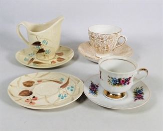 Teacups, Saucers, And Creamer
