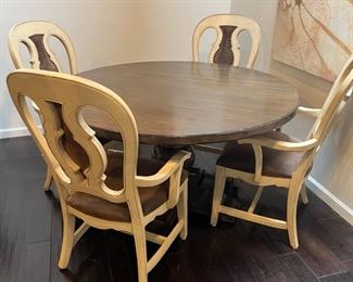 LORTS ROUND DINING TABLE AND CHAIRS 