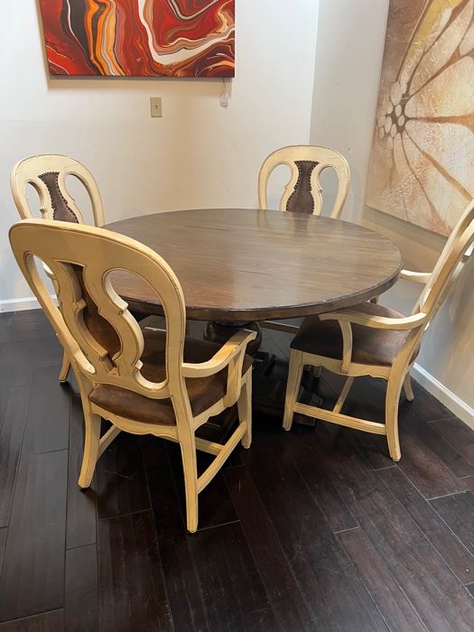 LORTS ROUND DINING TABLE AND CHAIRS 