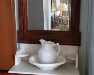 Antique Victorian walnut and marble washstand                     Contact Anita 816-262-5305