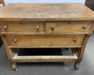 Antique Dresser with Wooden Wheels