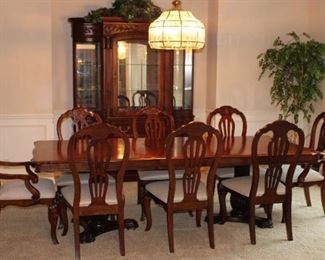 Carved Formal Dining Set includes table protectors. Beautiful!!