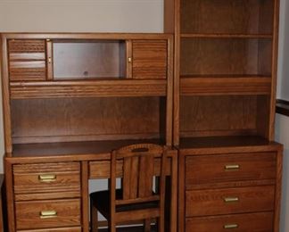 Home or office desk with plenty of drawer and shelf storage.  