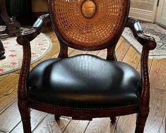 Pair of Maitland-Smith Spider Back Cane Arm Chairs with Black Leather Upholstered Seats. Photo 1 of 5.