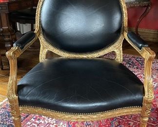 Pair of Antique Black Leather Gilt Bergere Chairs With Contrasting Fabric On Backs. Each Measures 34" x 30" D. Photo 1 of 4.