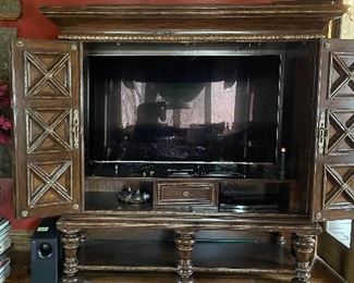 Maitland-Smith Reproduction Jacobean-Style Carved Walnut Hutch / Cabinet with Brass Hardware. Measures 74" W x 22" D x 78" H. Photo 4 of 6.