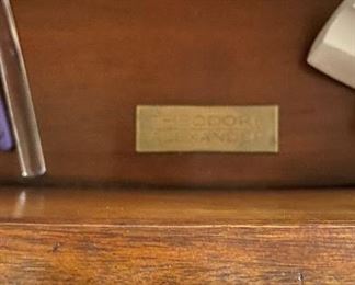 Theodore Alexander Leather Embossed Commode / Chest of Drawers with Lion Head Brass Pulls. Measures 38" W x 18" D x 32" H. Photo 2 of 6.