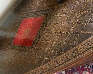 Theodore Alexander Leather Embossed Commode / Chest of Drawers with Lion Head Brass Pulls. Measures 38" W x 18" D x 32" H. Photo 5 of 6.