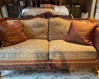 Reproduction Victorian Style Britt Carter Carved Wood Upholstered Two-Seat Sofa with Contrasting Fabric. Measures 82" W x 36" D. Photo 1 of 6.