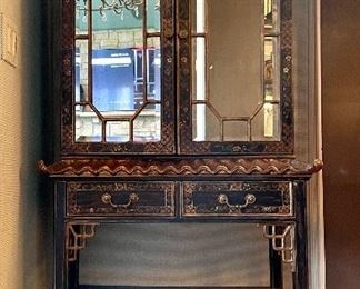 Britt Carter Ebonized Wood Pagoda-Style Mirrored Cabinet With Two Selves with Gilt Trimmed Chinoiserie Motif. Photo 1 of 6.
