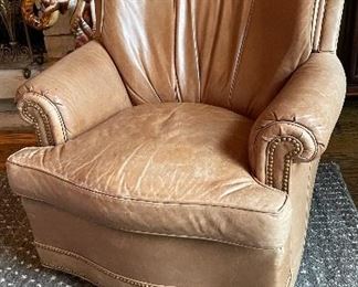Pair of Britt Carter Leather Upholstered Swivel Chairs with Nailhead Trim. Each Measures 35" W x 36" D. Photo 1 of 3.