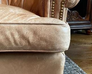 Pair of Britt Carter Leather Upholstered Swivel Chairs with Nailhead Trim. Each Measures 35" W x 36" D. Photo 3 of 3.
