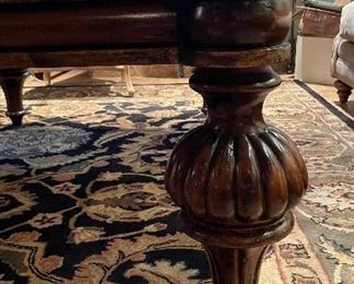 Britt Carter Marble Top Cocktail Table with Turned Wood Legs. Measures 39" W x 59" D x 22" H. Photo 2 of 2.