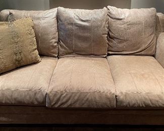 Century Leather Upholstered Three-Seat Sofa with Nailhead Trim. Measures 86" W x 44" D. Photo 1 of 2.