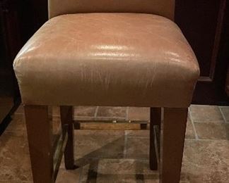 Pair of Leather Upholstered Counter Stools with Brass Foot Rests. Photo 1 of 3.