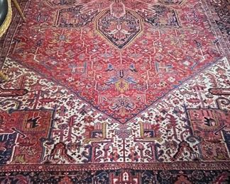 Antique Wool Heriz Rug. Measures 9' 10" x 13' 10.” Photo 2 of 6.