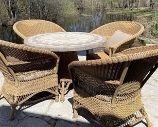 Woodard Summerwind 42" Round Stone Top Dining Table with Umbrella Hole. Photo 1 of 3.