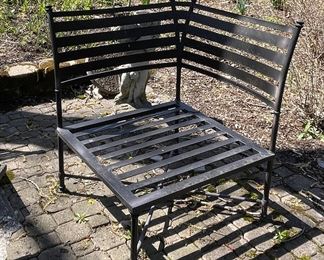 Sections of a 4-Piece Metal Outdoor Sectional Sofa. Measures 64" - 122" W x 35" D. Photo 1 of 2.