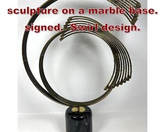 Lot 642 C. Jere metal sculpture on a marble base. signed. Swirl design. 