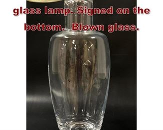 Lot 665 Simon Pearce clear glass lamp. Signed on the bottom. Blown glass.
