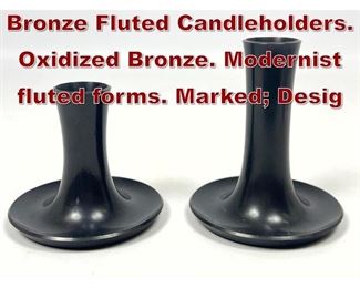 Lot 678 2pc TED MUEHLING Bronze Fluted Candleholders. Oxidized Bronze. Modernist fluted forms. Marked Desig