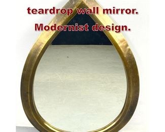 Lot 724 Bronze tone metal teardrop wall mirror. Modernist design.