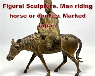 Lot 787 Japan Gilt Metal Figural Sculpture. Man riding horse or donkey. Marked Japan. 