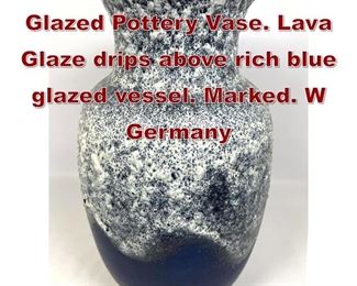 Lot 852 WEST GERMAN Glazed Pottery Vase. Lava Glaze drips above rich blue glazed vessel. Marked. W Germany 