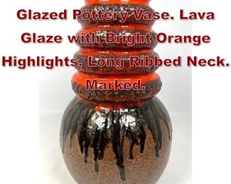 Lot 853 WEST GERMAN Glazed Pottery Vase. Lava Glaze with Bright Orange Highlights. Long Ribbed Neck. Marked.