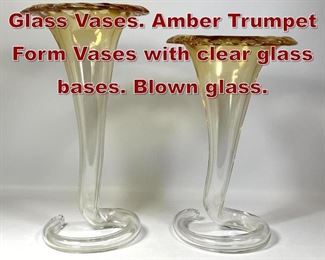 Lot 866 2pc Floriform Art Glass Vases. Amber Trumpet Form Vases with clear glass bases. Blown glass.