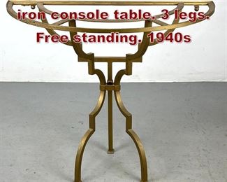 Lot 887 French Art Deco Gilt iron console table. 3 legs. Free standing. 1940s