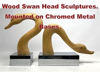 Lot 937 Pr Modernist Carved Wood Swan Head Sculptures. Mounted on Chromed Metal Bases. 