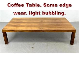 Lot 967 Oversized Rosewood Coffee Table. Some edge wear. light bubbling. 