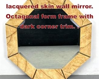 Lot 987 Karl Springer style lacquered skin wall mirror. Octagonal form frame with dark corner trim. . 