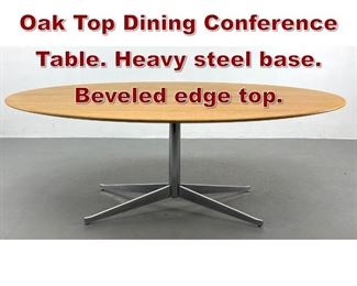 Lot 1031 Florence Knoll Oval Oak Top Dining Conference Table. Heavy steel base. Beveled edge top. 