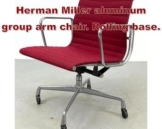 Lot 1040 Charles Eames for Herman Miller aluminum group arm chair. Rolling base. 