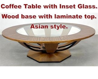 Lot 1112 Decorator Round Coffee Table with Inset Glass. Wood base with laminate top. Asian style. 