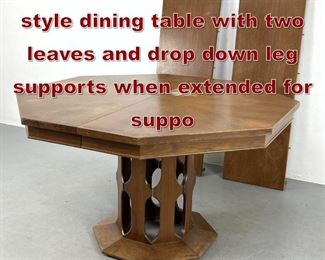 Lot 1114 Harvey Probber style dining table with two leaves and drop down leg supports when extended for suppo