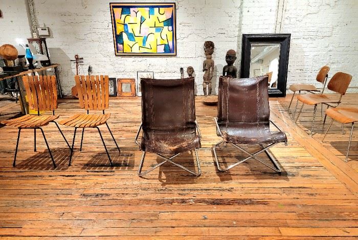 -Two original Arthur Umanoff slat chairs (front left) **
-Two original Takeshi Nii leather & chrome chairs (front right) **
-Three original Eames molded plywood DCM chairs. (Back right)
**

**Highest offer.