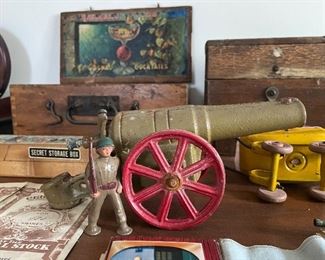 Cast iron cannonball and soldier figurine