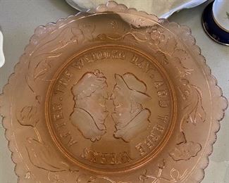 Depression glass with etching of happy couple reversed image