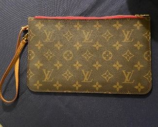 Authentic Louis Vuitton Monogram Wristlet with Pink Canvas Lining -front