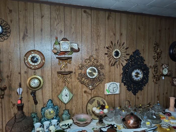Wall of mid-century modern clocks